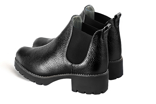 Satin black women's ankle boots, with elastics. Round toe. Low rubber soles. Rear view - Florence KOOIJMAN